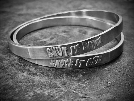 the "Shut it down or Knock it off Bangle for R.I. Foundations COVID-19 Response Fund